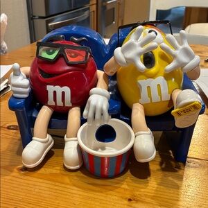 M&M'S Red and Yellow Figures on Blue Seat
